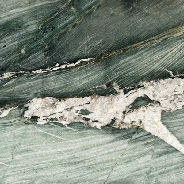 Beautiful green marble with natural white veining, ideal for interior and exterior design, countertops, and flooring. Premium quality stone from Global Stone, offering elegance and durability.